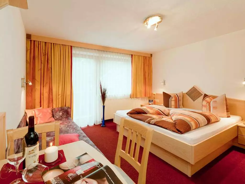 Dreibettzimmer mit Balkon